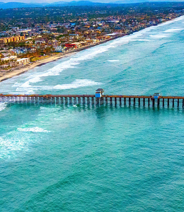 Bird's eye view of downtown Oceanside with pier.