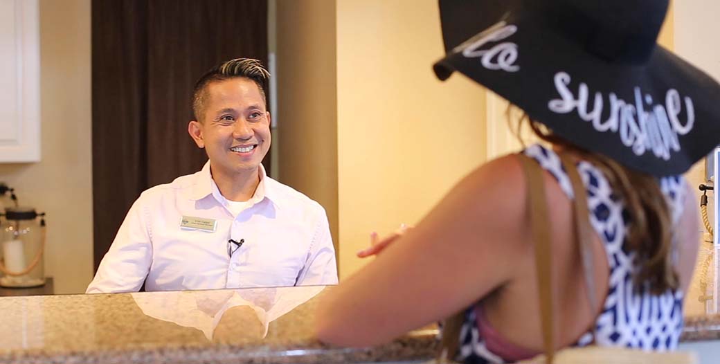 Front Desk assisting guest