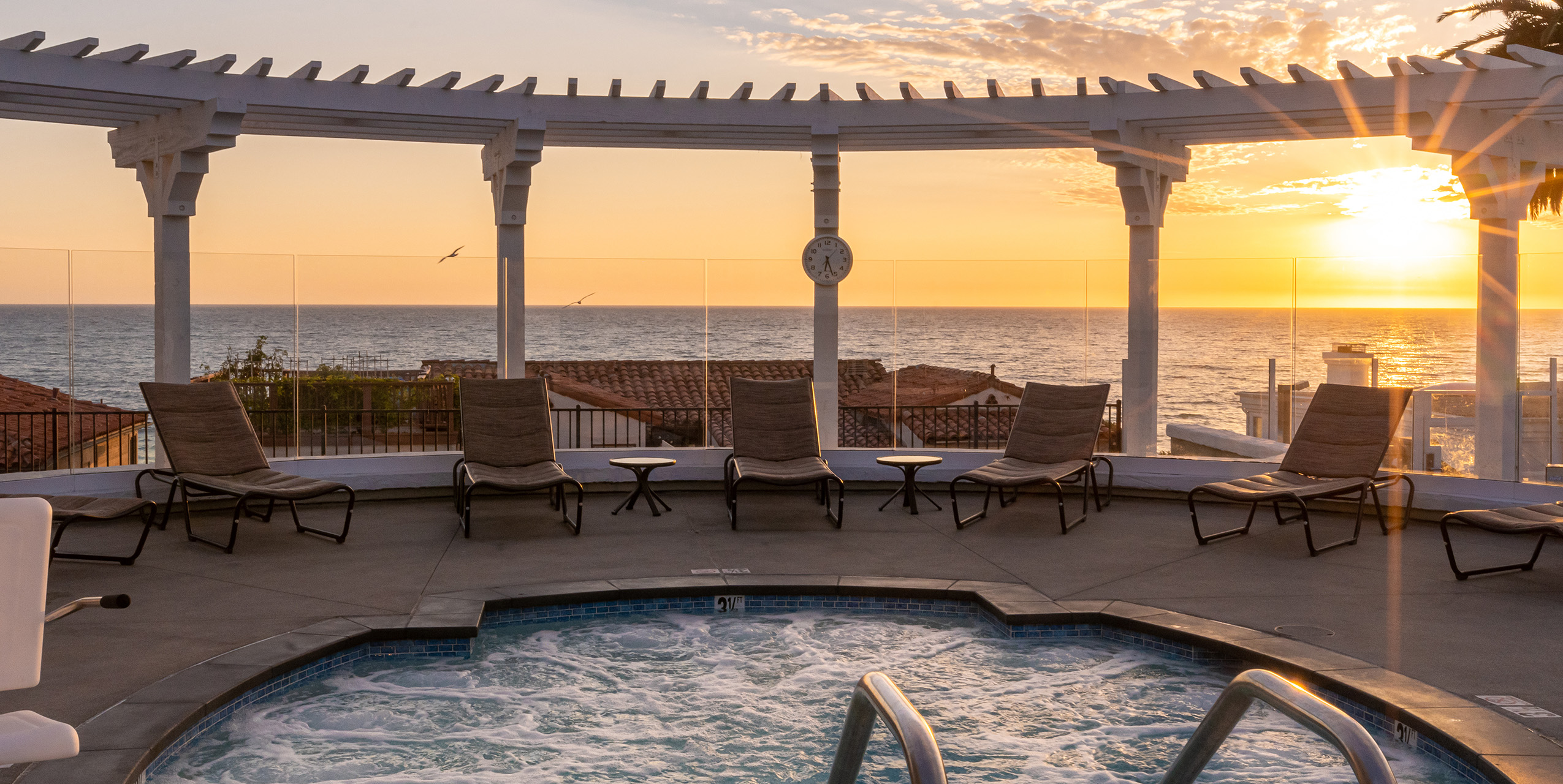 Carlsbad Inn Beach Resort adult hot tub at sunset